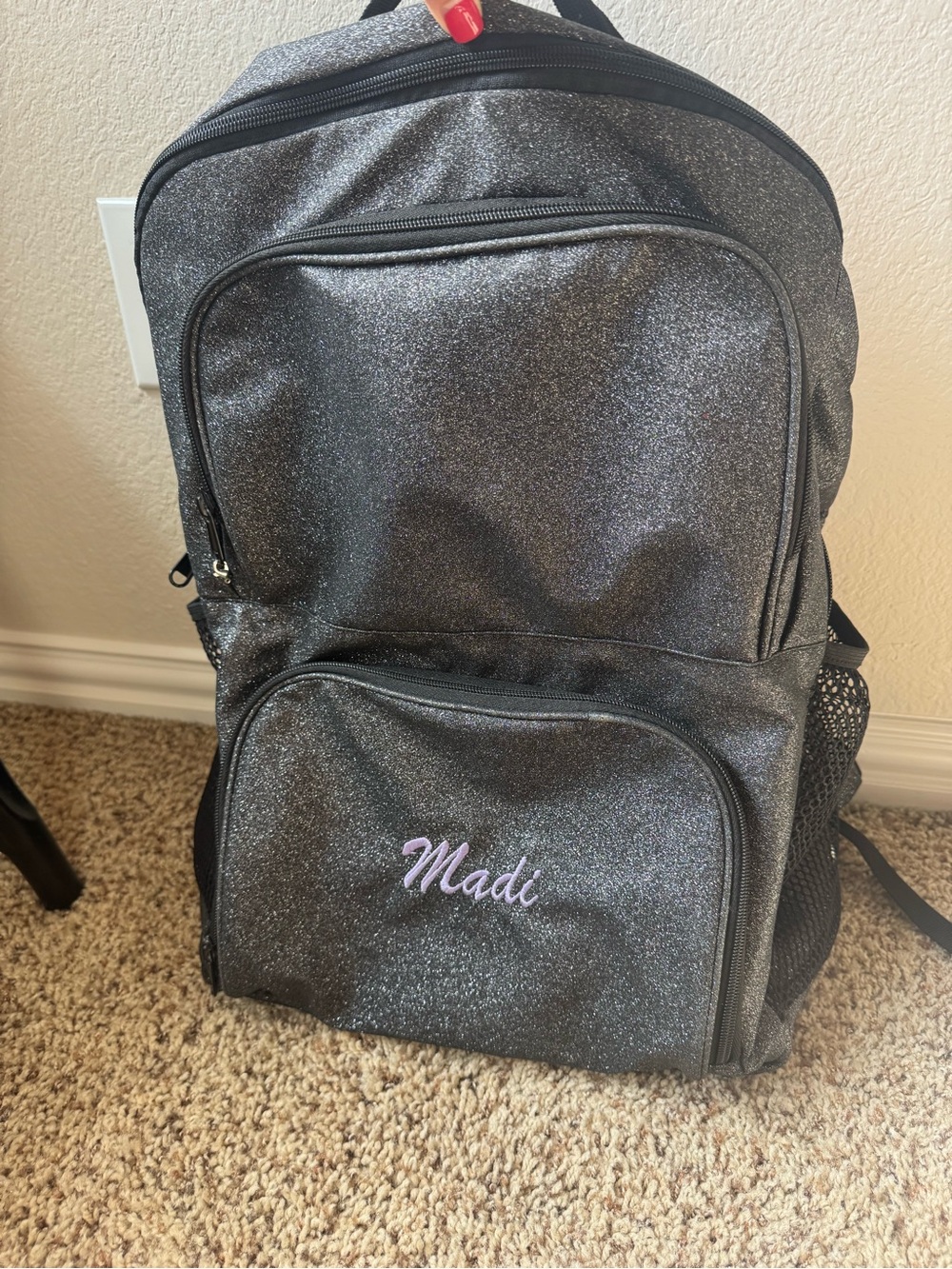 Black glitter backpack with “Madi” embroidered like new